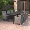 Stylish patio dining set with 6 cushioned chairs.