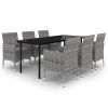 Stylish patio dining set with 6 cushioned chairs.