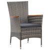 Poly rattan patio dining set, table and 8 chairs with cushions.
